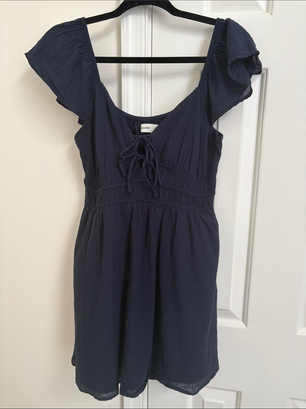 Navy flutter sleeve sundress with shorts
